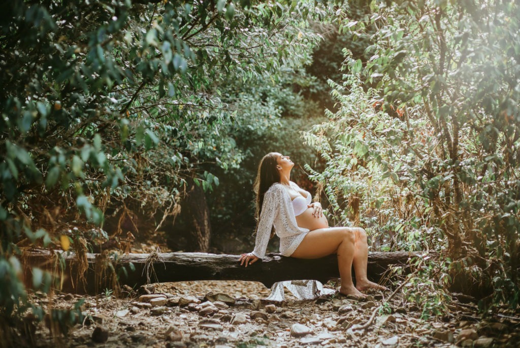 pregnant woman in forest