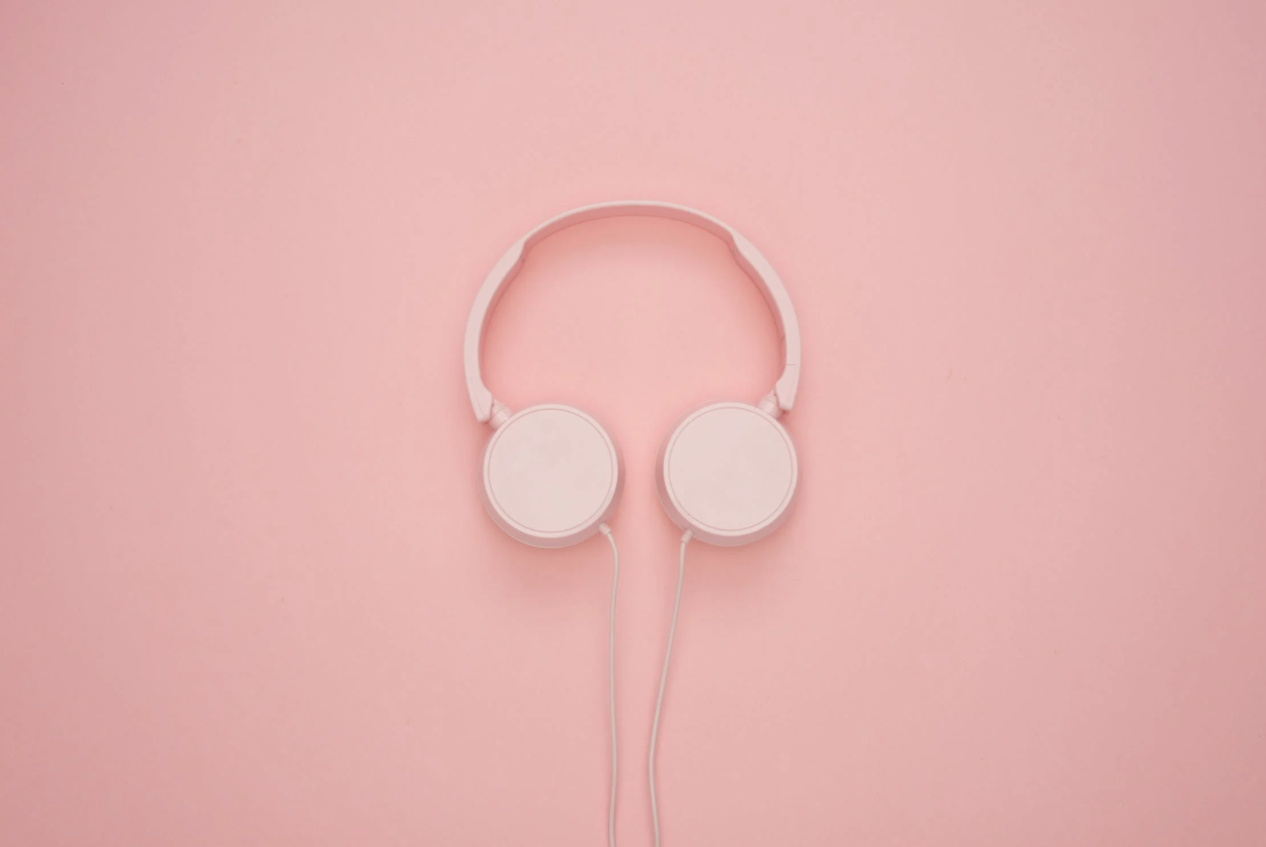 pink headphones on a pink table